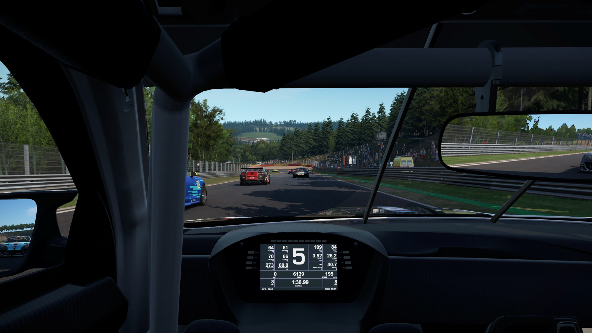 A screenshot of Automobilista 2 at Spa-Francorchamps, during a GT race